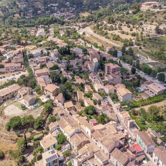 Puigpunyent village with mountain backdrop in the Serra de Tramuntana.