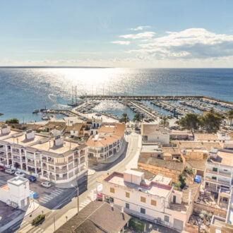 S’Estanyol de Migjorn marina with boats and Mediterranean sea view