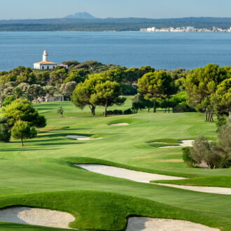 Club de Golf Alcanada fairway with lighthouse and sea views in Mallorca
