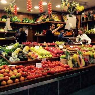 Fresh produce and seafood stalls inside Mercat de l’Olivar, Palma.