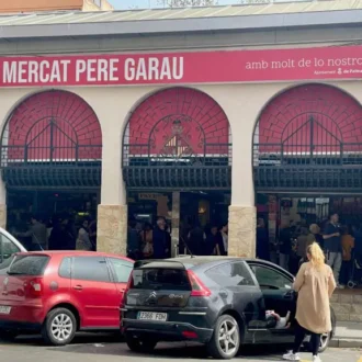 Pere Garau Market square in Palma with stalls and local shoppers