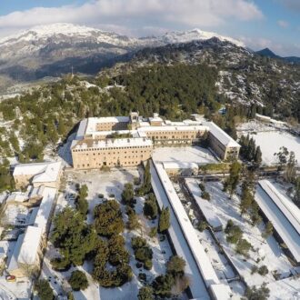 Aerial view of Lluc Monastery and valley in Mallorca’s Tramuntana Mountains